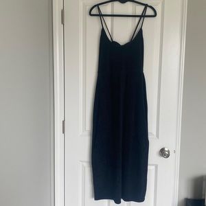 Black terry cloth fitted dress with 2 side slits and open tie back